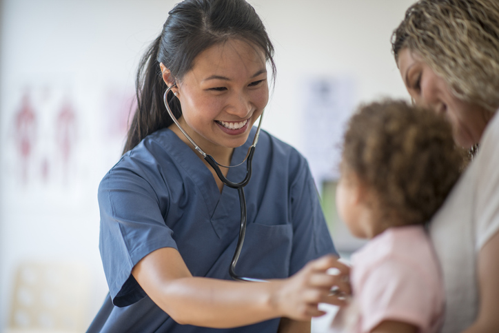 Little Girl at a Check Up with Her Mother